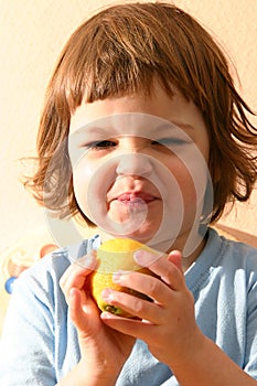 Child and lemons