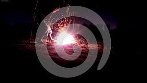 A child lighting firecrackers at night, Dipawali festival celebration