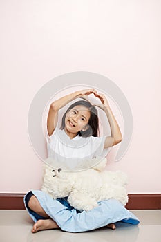 Child little girl asian thai nationality with white toy teddy be