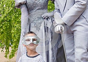 Child with living statues
