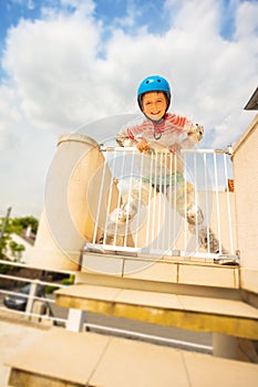 Child look down from safe door in bubble wrap