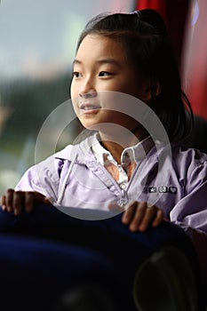 Child look outside on bus