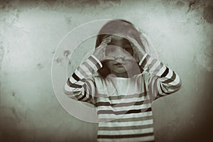 Child looking through imaginary binocular