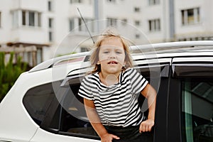 Child looking out the car