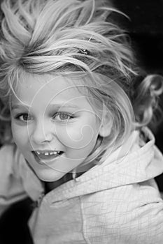 Child losing her first tooth