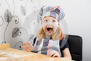 Child making Christmas cookies