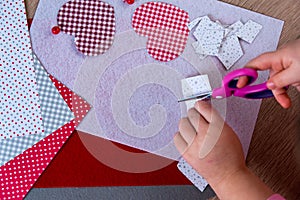 Child making greeting card for Mothers Day