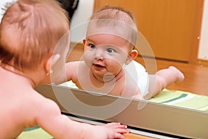 Child in the mirror photo