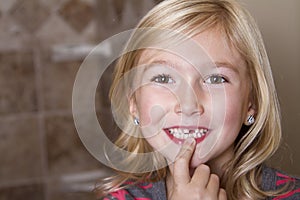 Child missing front tooth