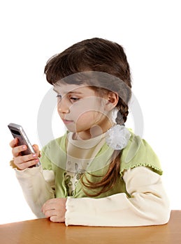 Child with mobile phone.