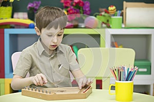 A child with a musical instrument.