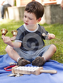 Child with musical instruments