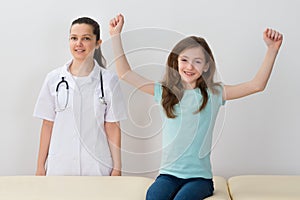 Child Next To Doctor In Hospital