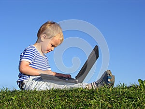 Child with notebook sit blue sky 2