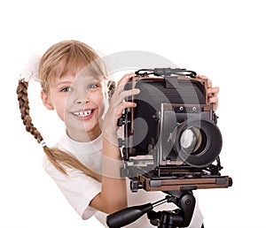 Child with old large format digital camera.