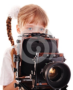 Child with old wood large format digital camera.