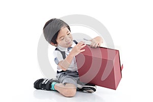 Child opening gift present box on white background