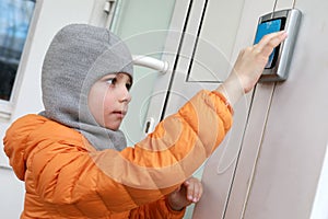 Child opens door with card