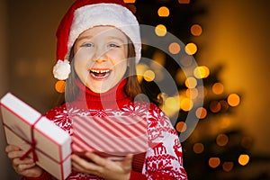 Child opens magic gift box.