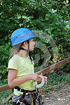 Child in the outfit for rope parkour