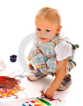 Child painting by finger paint