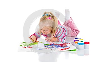 Child painting with fingers
