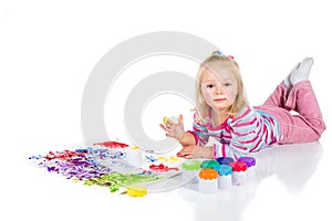 Child painting with fingers