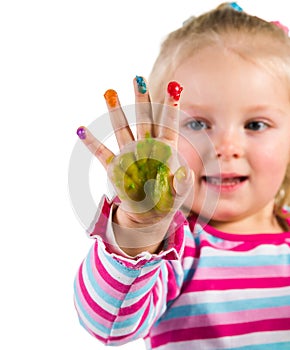 Child painting with fingers