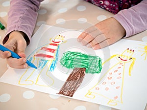 Child is painting a picture photo
