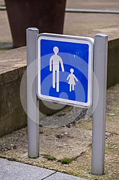 Child and parent pedestrian walking zone sign