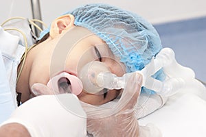 Child patient receiving artificial ventilation