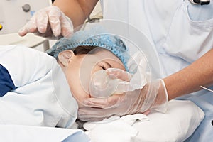 Child patient receiving artificial ventilation