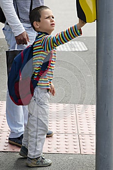 Child at pedestrian road crossing