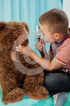 Child performs a medical examination