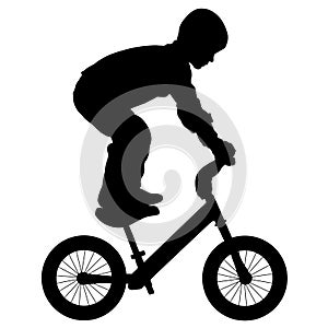 Child performs a trick on a bike, silhouette vector.