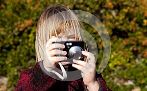 Child photographer photographing taking photo