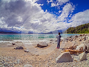 Child photographing the lake