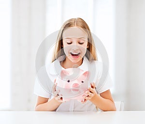 Child with piggy bank