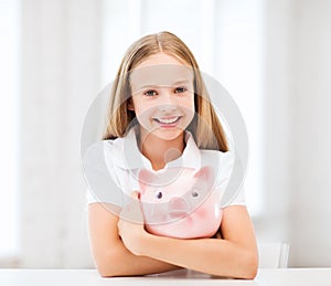 Child with piggy bank