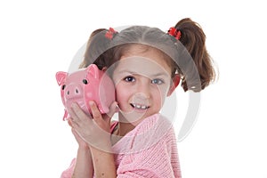 Child with piggy bank money box