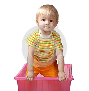 Child in a pink box