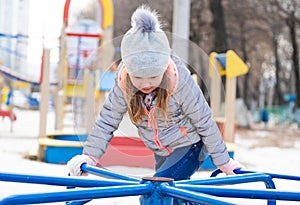 Child plating at playground toys