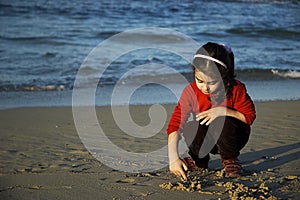 Child play on the beach