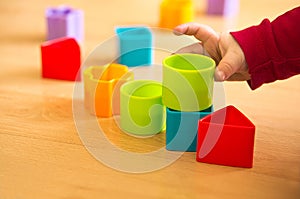 Child play with toy blocks