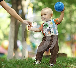 Child playing with ball in park