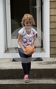 Child playing ball