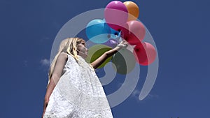 Child Playing Balloons Looking at Blue Sky, Happy Girl at Birthday Outdoor