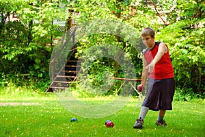 Child Playing Bocce Ball