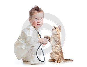 Child playing doctor with stethoscope and cat