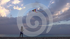 Child Playing Flying Kite on Beach, Sunset, Girl on Coastline, Sun Rays 4K